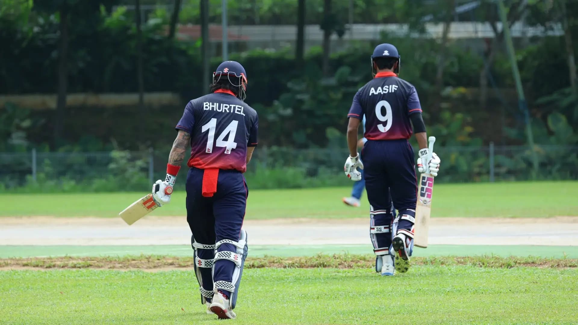 Nepal's batting openers Kushal Bhurtel and Aasif Sheikh