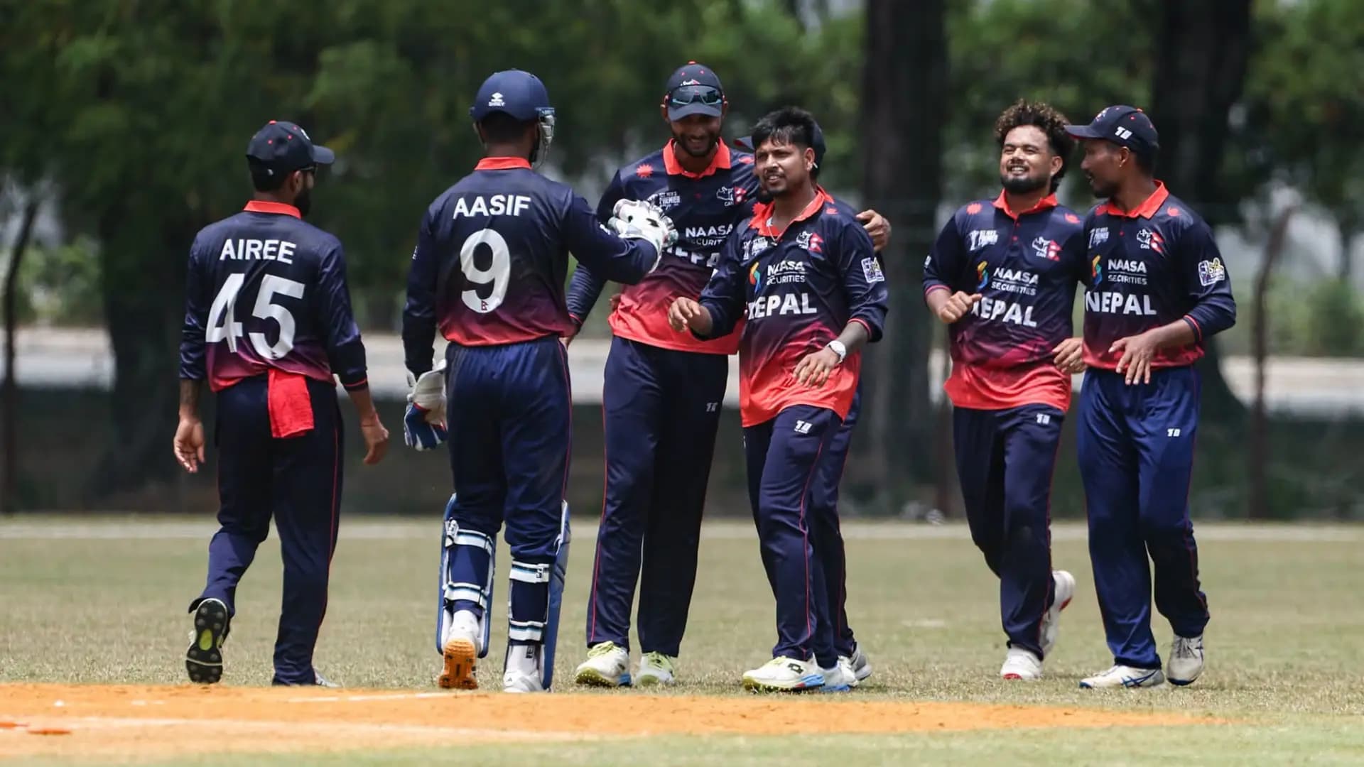 Sandeep Lamichhane celebrates